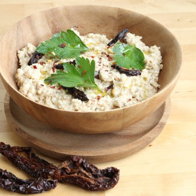 Raw Creamy Cauliflower "Rice" Risotto with Sun-Dried Tomatoes