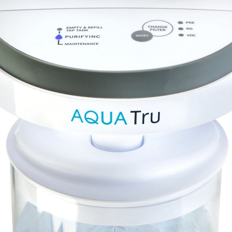 AquaTru Carafe - Glass with control panel and visible branding