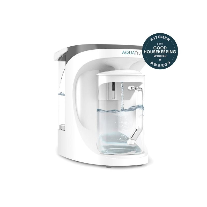 AquaTru Carafe - Glass with Aquafilter branding on a white background