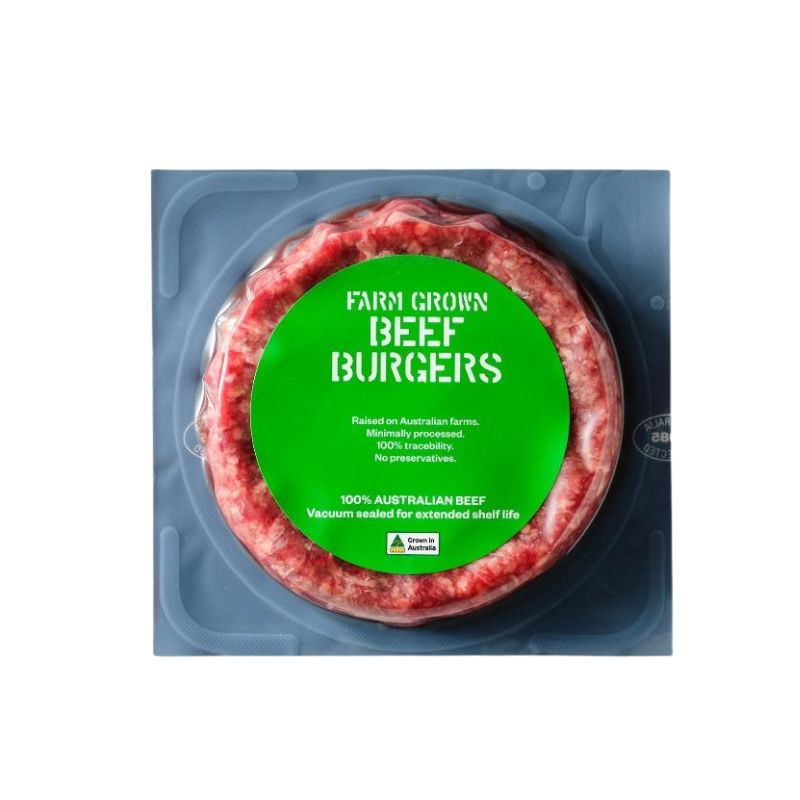 Packaged Australian AMG Grass Fed Burger Patty with a green label on a white background