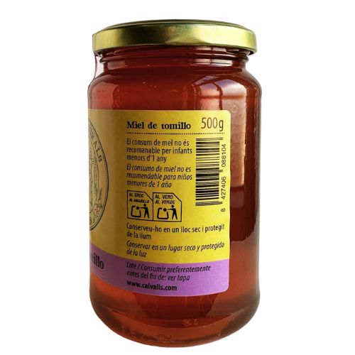 Jar of Cal Valls Thyme Honey with a gold lid on a white background