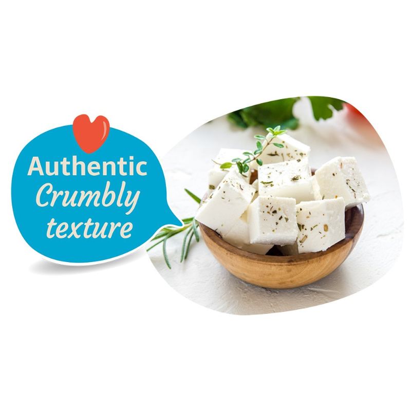 Cubed GREEN VIE Greek Style Feta Cheese (Plant Based) in a wooden bowl with text 'Authentic Crumbly texture' on a white background