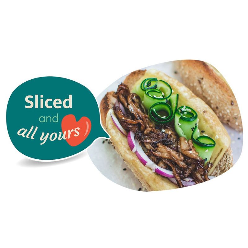 Sandwich with GREEN VIE Vegan Smoked Gouda Flavour Slices, sliced meat, onions, and green onions on a bun, with a speech bubble saying 'Sliced and all yours'.
