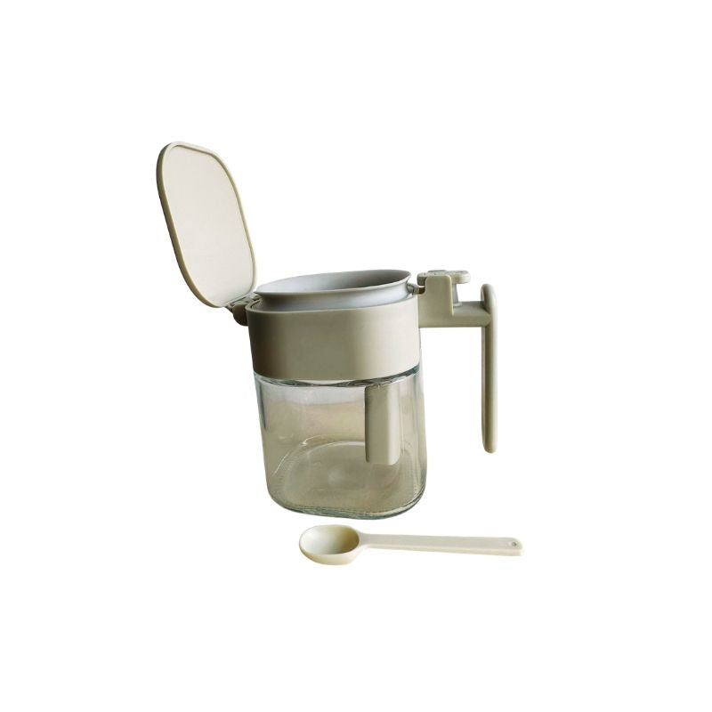 Japanese-Style Airtight Condiment Glass Pot - 300ml and spoon on a white background
