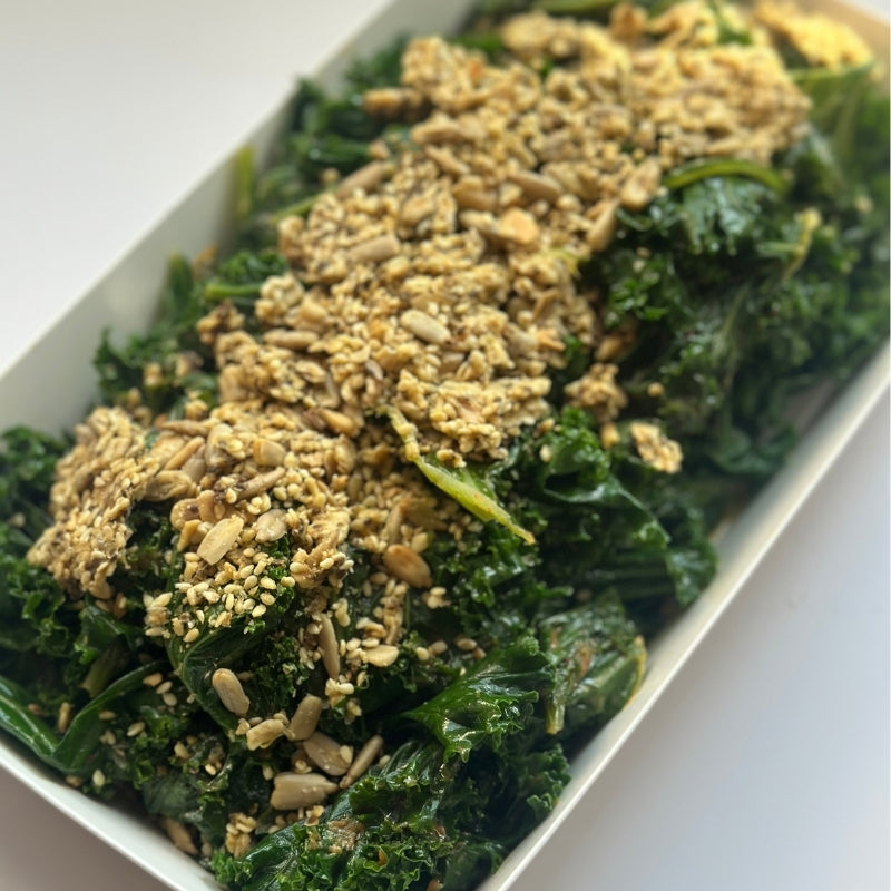 A close up of Kale Salad with Chilli Miso Dressing and Vegan Cheesy Seed Crunch Topper - (400g | Serves 4 – 6 people)
Foodcraft Online Store