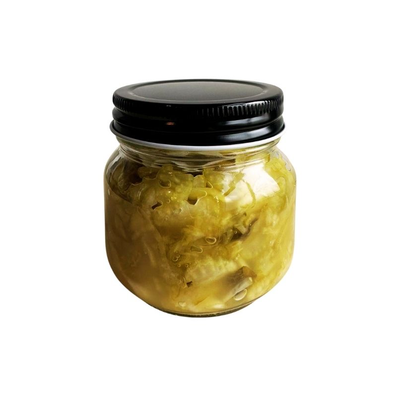 Jar of Living Lacto-Fermented Celery with Mint  - 200g with a black lid on a white background