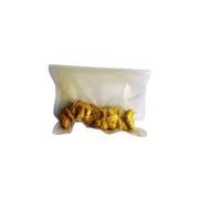 A clear plastic vacuum-sealed bag containing Living Lacto-Fermented Takuan - 150g, shown on a plain white background.