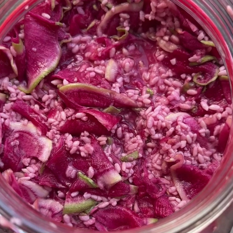 Close-up ofLiving Lacto-Fermented Watermelon Radish Koji Zuke in a jar