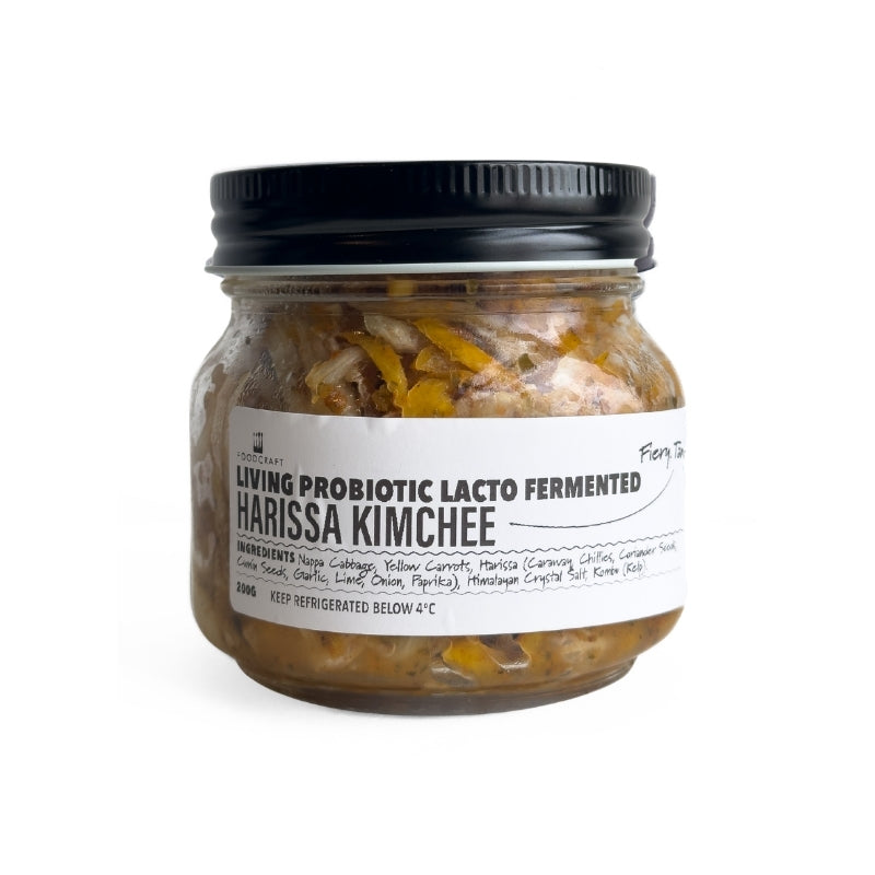 Jar of Living Probiotic Lacto Fermented Harissa Kimchee on a white background