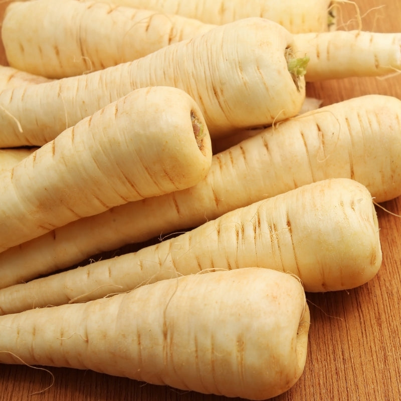 Close-up of parsnips on a wooden surface