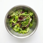 A top-down view of Mesclun Salad Mix - 200g inside a stainless steel bowl on a clean white background.