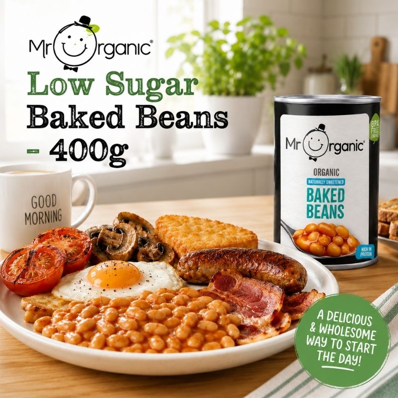 A plate of Full English breakfast with eggs, sausage, bacon, mushrooms, hash brown and Mr Organic Naturally Sweetened Baked Beans 400g in a bright modern kitchen. Organic baked beans high in protein, available in Hong Kong.