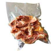 Vacuum-sealed package of Pasture Raised Chicken Carcass - 1.3kg on a white background