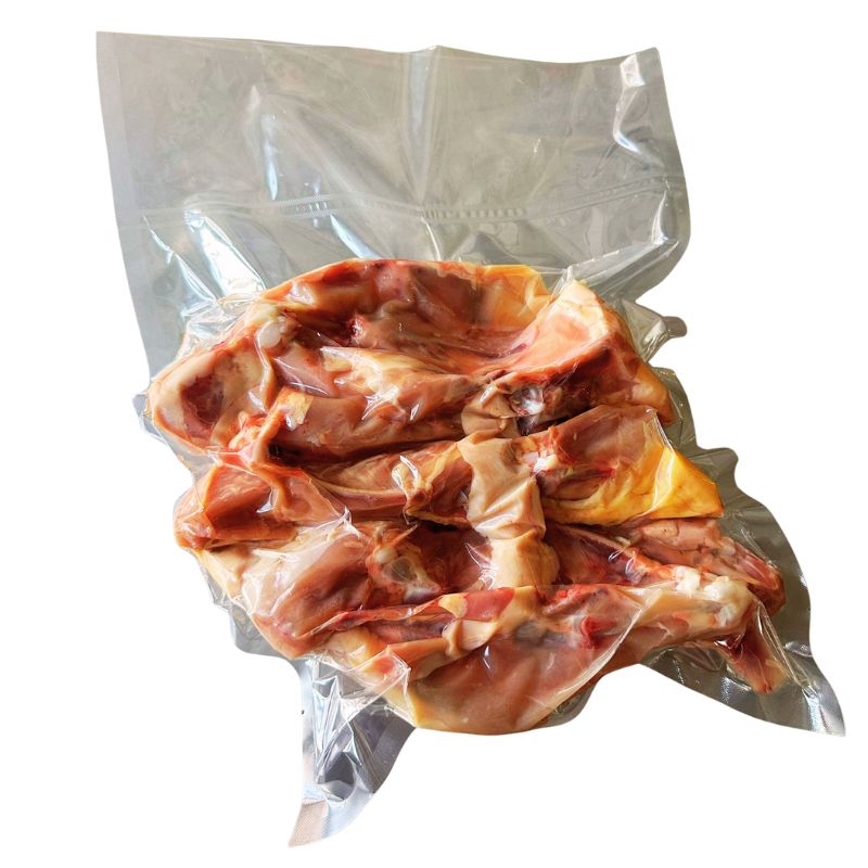 Vacuum-sealed package of Pasture Raised Chicken Carcass - 1.3kg on a white background