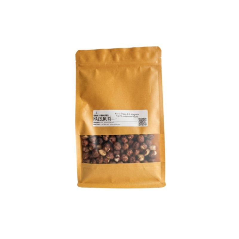 A stand-up kraft paper pouch of Raw Sprouted Hazelnuts - 400g with a clear window showing the brown nuts inside, on a plain white background.