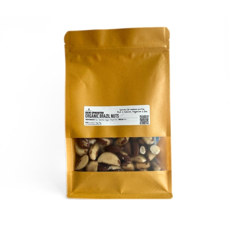 A stand-up pouch of rRaw Sprouted Organic Brazil Nuts - Foodcraft Online Store with a clear window showing the nuts inside, set against a plain white background.