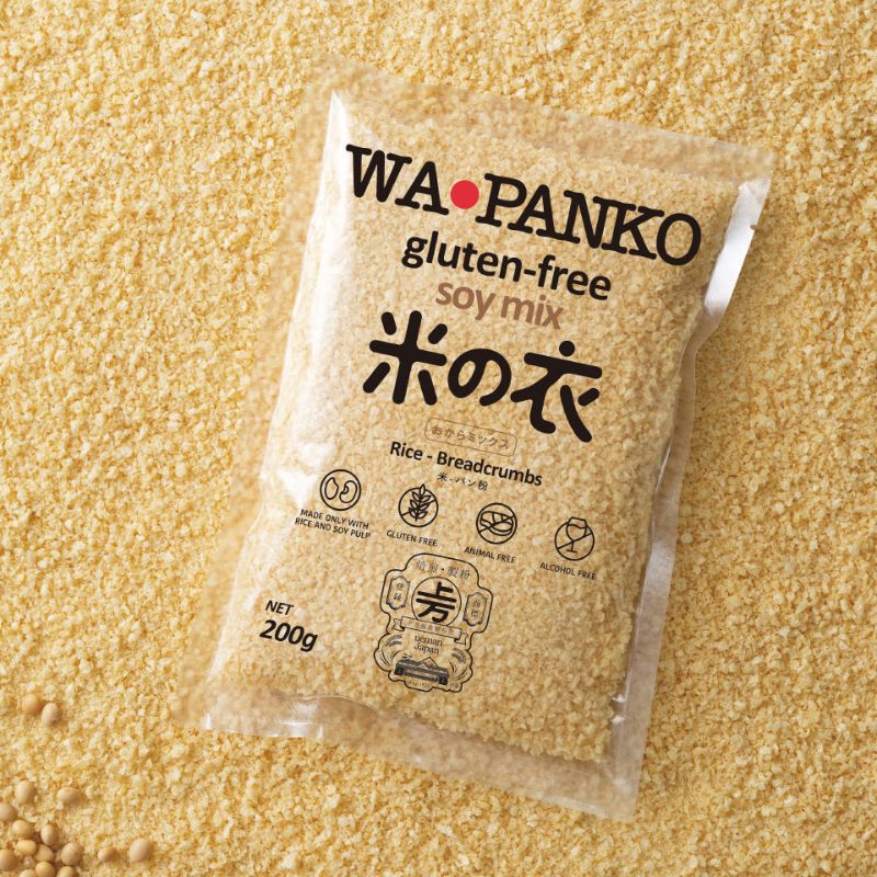Wapanko gluten-free soy mix package on a bed of rice or bread crumbs